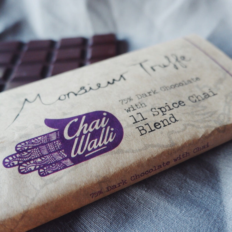 Chai Walli Chai Chocolate bar with its cover on top showing the Chai Walli logo 